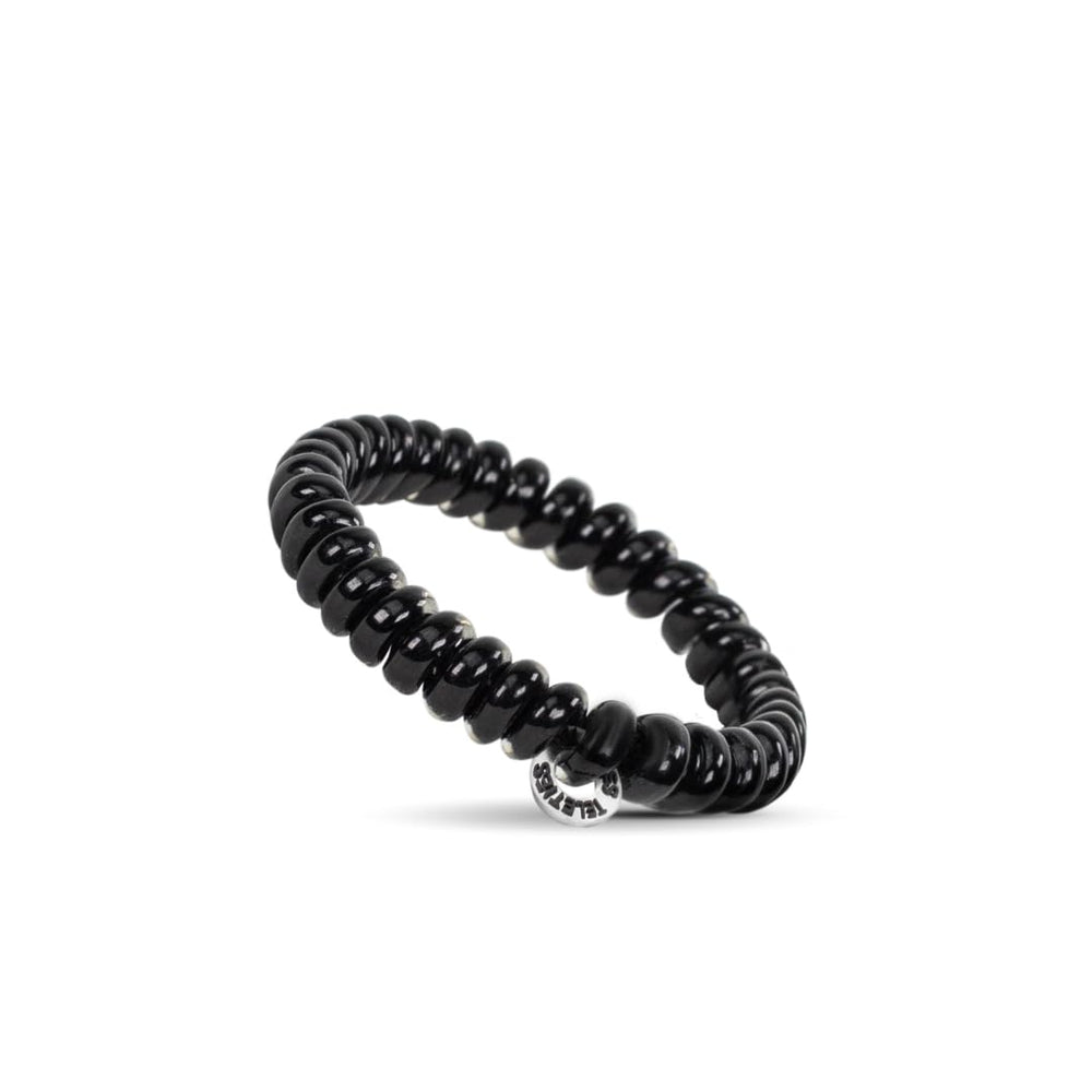 Teleties jet black worn in a ponytail demonstrating secure no‑slip hold