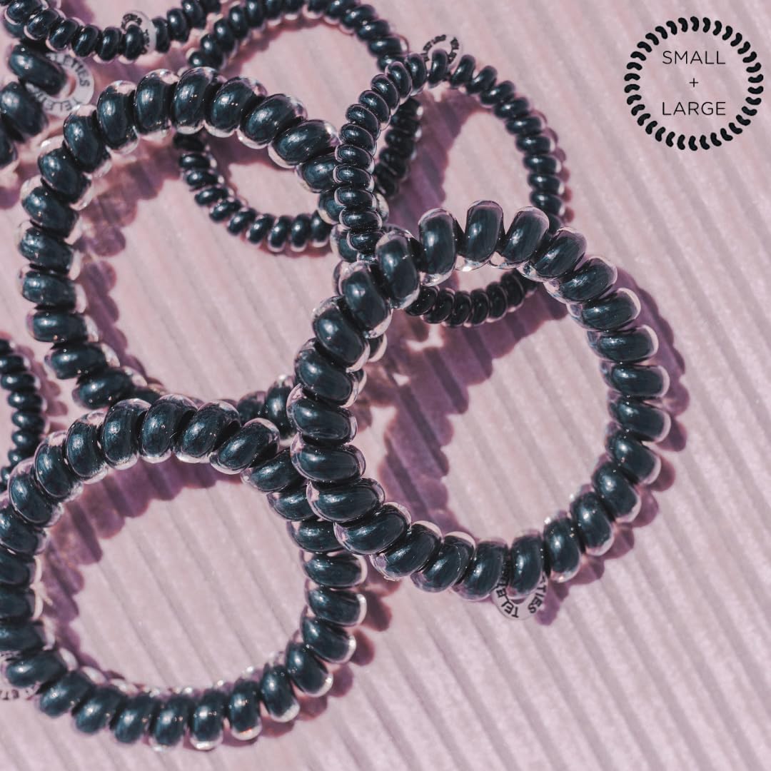 Teleties jet black under water droplets showing water‑resistant quick‑dry benefit