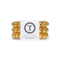 Teleties front packaging showing three Sunset Gold coils, durable hold