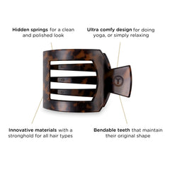 TELETIES clip worn during yoga showing stable hold and movement-friendly fit