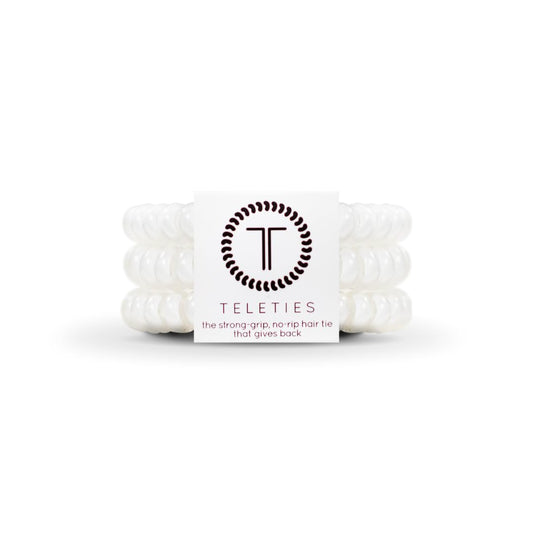 TELETIES small 3-pack front view shows clean Coconut White and secure packaging benefit