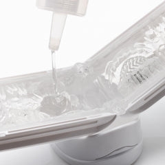 TENGA bottle on bathroom counter suggesting travel-ready convenience and discreet storage
