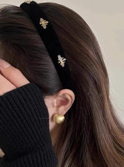 TERSE black velvet headband front view showing elegant look and comfortable fit