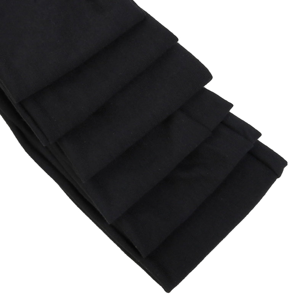 TERSE headband worn during yoga showing secure hold and comfortable fit for workouts