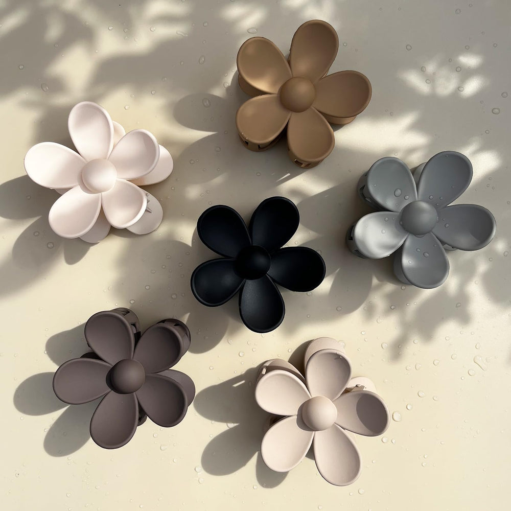 Tetizo clips styled on a vanity table suggesting everyday use and outfit coordination