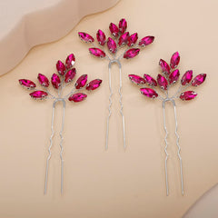 Teyglen front view of three rose red crystal hair pins showing design and shine