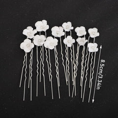Teyglen pack of 12 gold flower hair clips arranged for event coordination