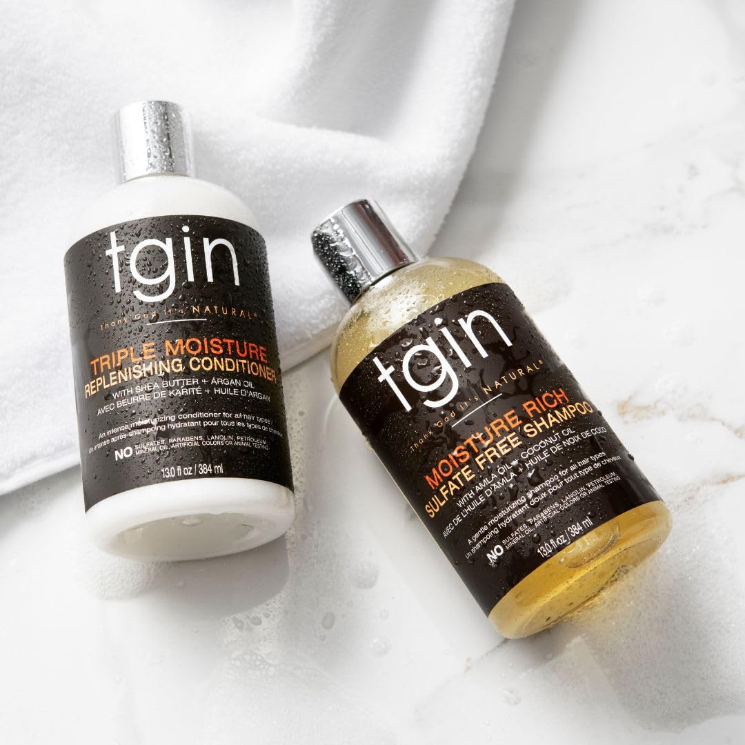 tgin conditioner cream in hand showing rich moisturizing texture