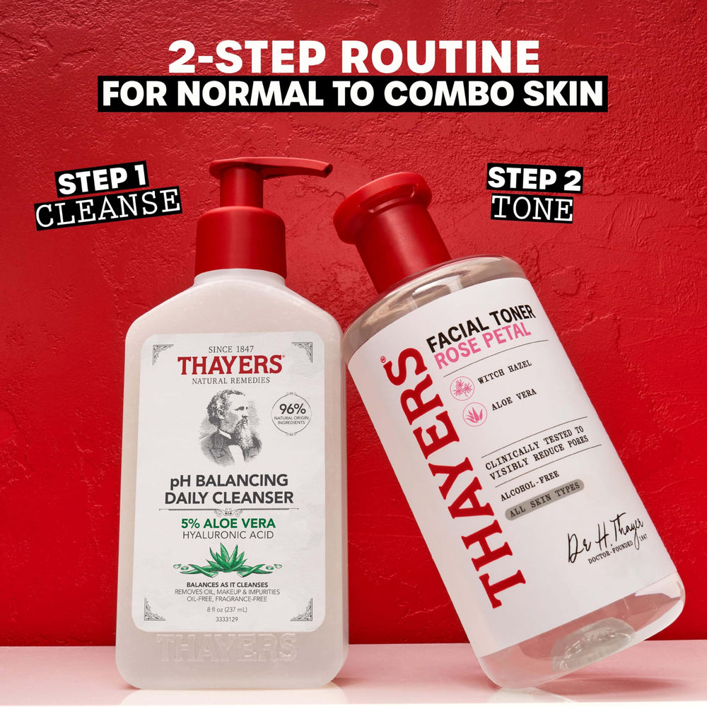 Hand holding Thayers 12 fl oz bottle to show real-life size and portability