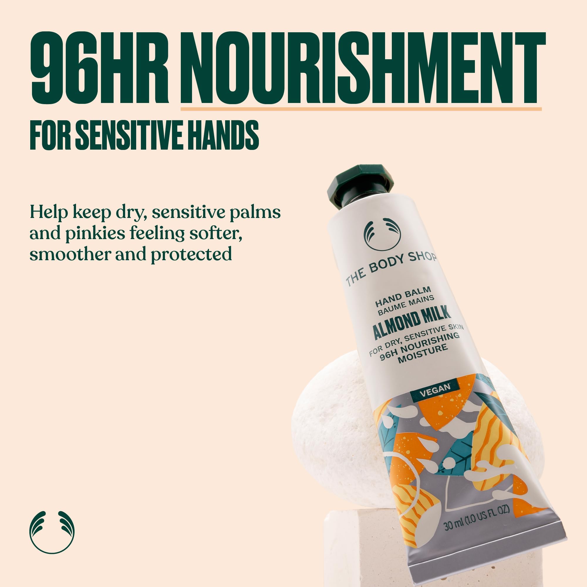 The Body Shop hand balm open tube texture swatch showing smooth, fast-absorbing formula benefit