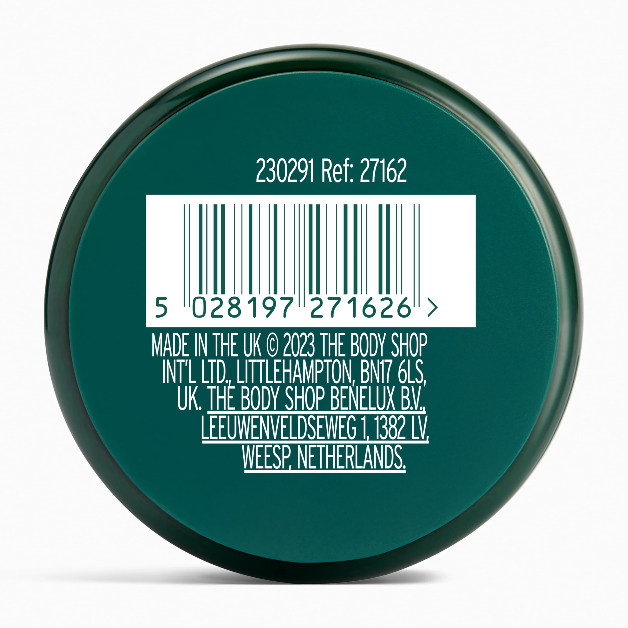 The Body Shop charcoal mask with bamboo charcoal pieces showing absorbent detox benefit