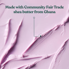 The Body Shop dewberry body butter being massaged into hand for soft skin benefit