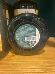The Body Shop mango body butter in a serene bathroom setting to show daily routine use