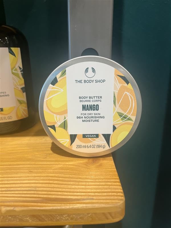 The Body Shop mango body butter recycled plastic tub and aluminium lid to show eco packaging
