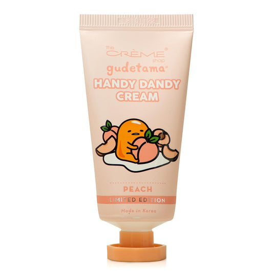 The Crème Shop Hello Kitty peach front packaging showing compact tube with cute design and travel convenience