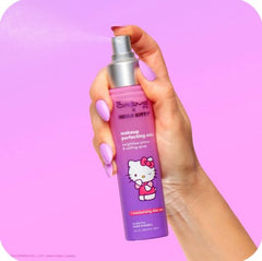 THE CRÈME SHOP Hello Kitty purple front packaging showing bottle and label benefits