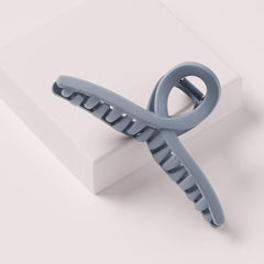 The Hair Edit clip in hair demonstrating French twist hold for polished updo benefit