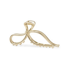 The Hair Edit front view of gold bow clip showing elegant silhouette and fast hold