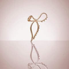 The Hair Edit clip holding a half-up style demonstrating practical elegant hold