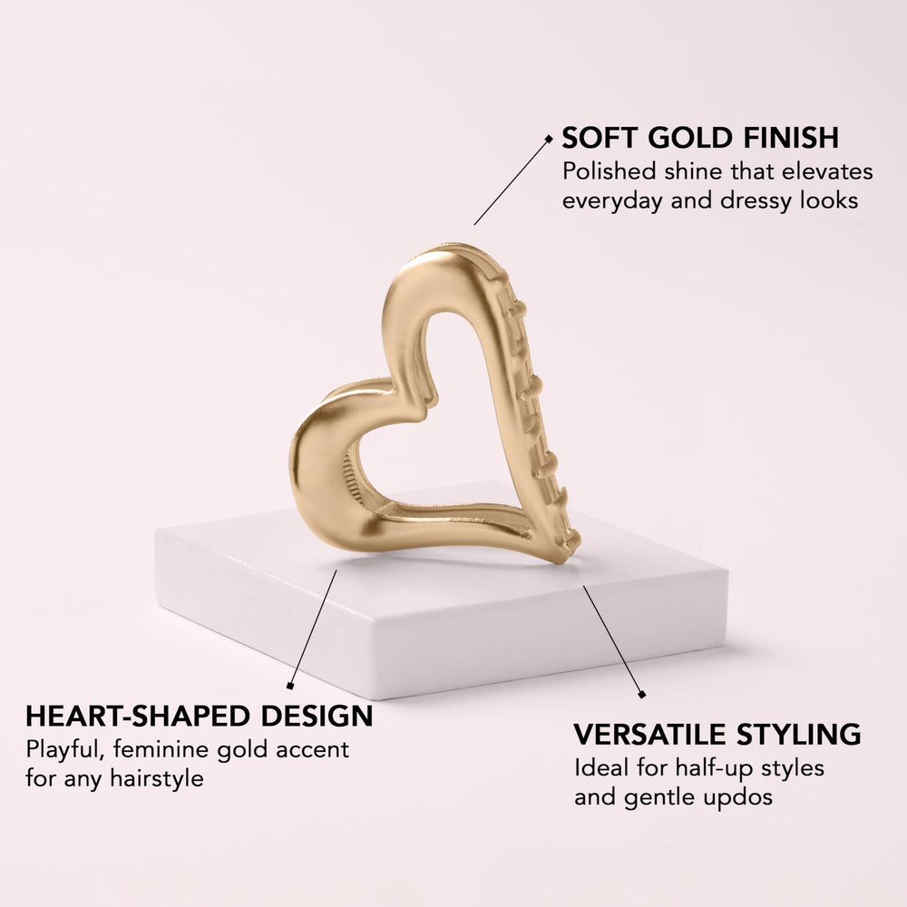 The Hair Edit heart clip close teeth grip showing metal claw and even hold benefit: no slipping