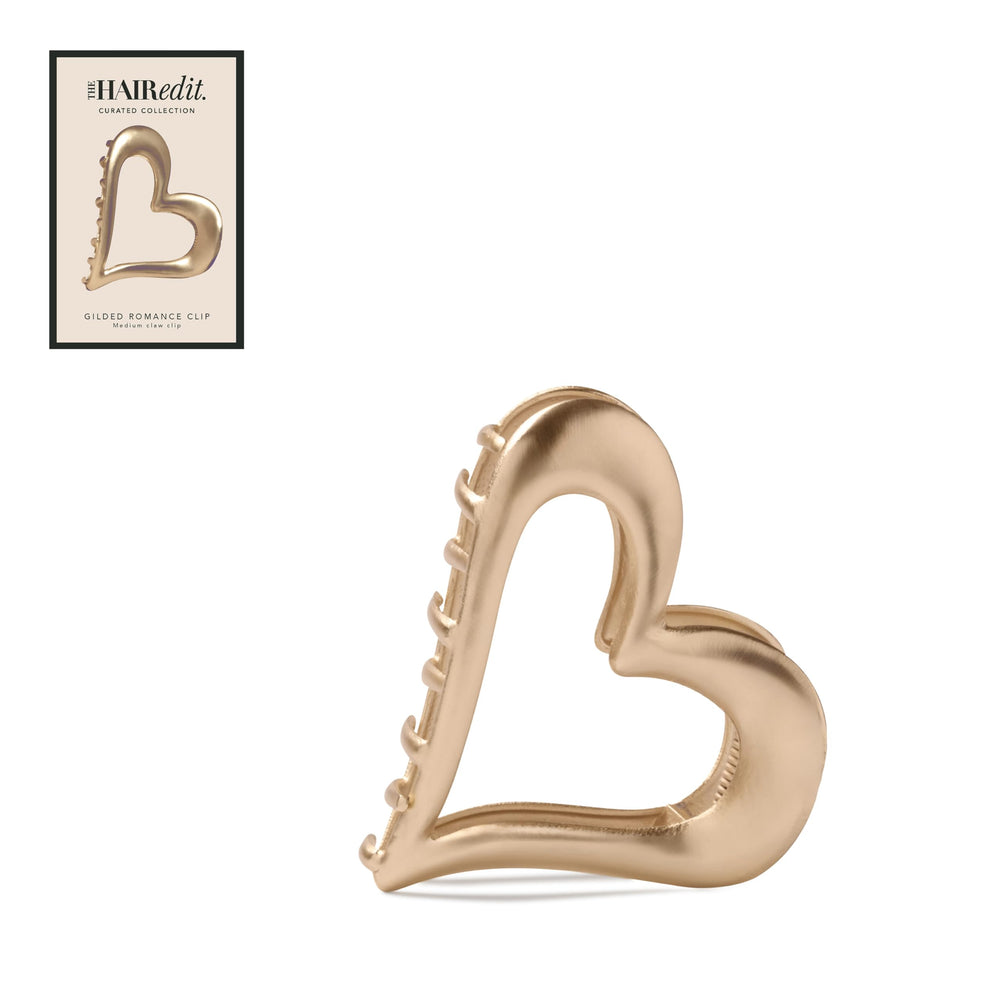 The Hair Edit heart clip front view showing elegant gold finish and romantic shape benefit: polished look
