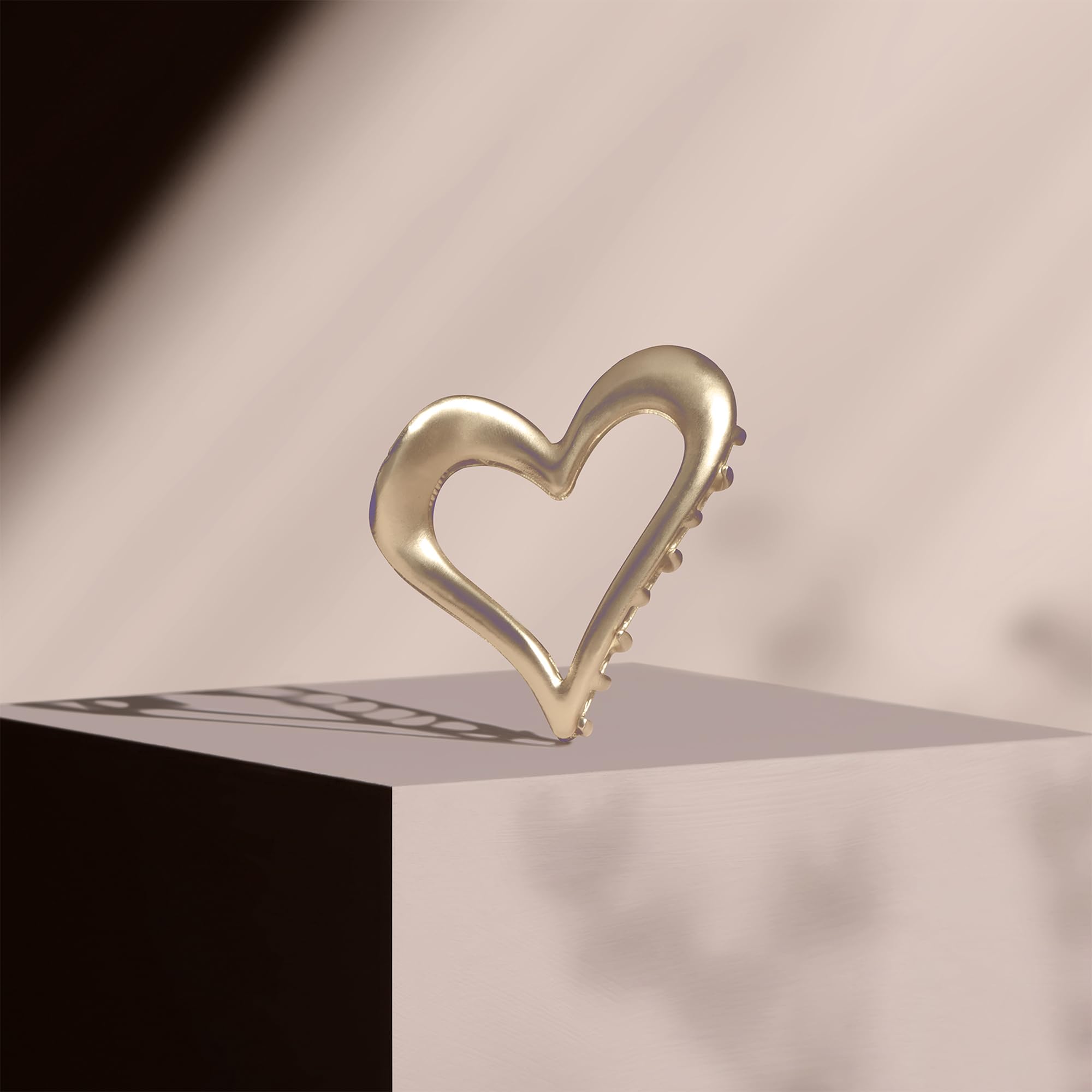 The Hair Edit heart clip in hair half-up demonstrating secure styling and flattering lift benefit: tidy finish