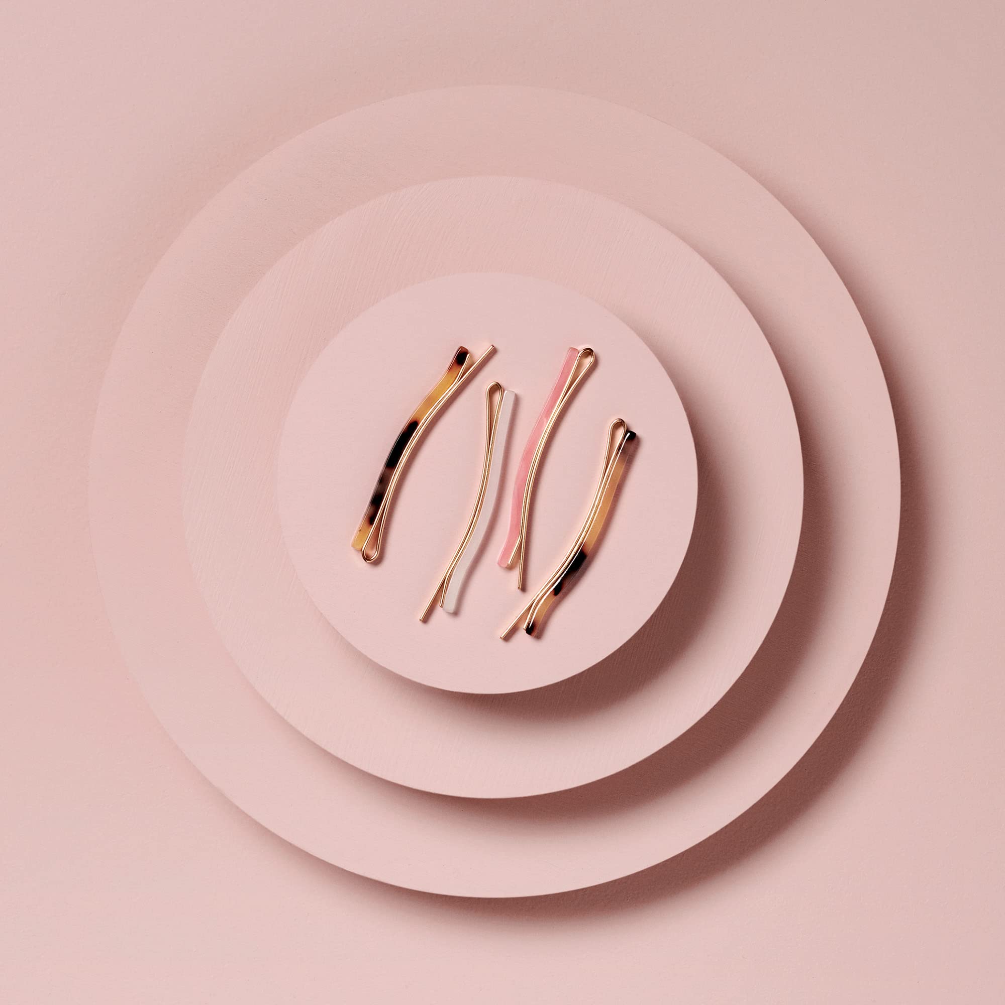 The Hair Edit pins in a styled flatlay with accessories for fashionable finishing touches