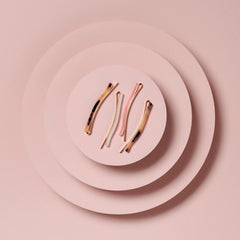 The Hair Edit pins in a styled flatlay with accessories for fashionable finishing touches