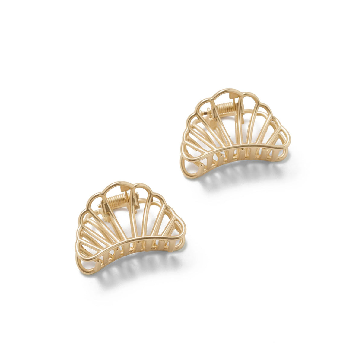 The Hair Edit front view showing two gold shell clips for subtle style