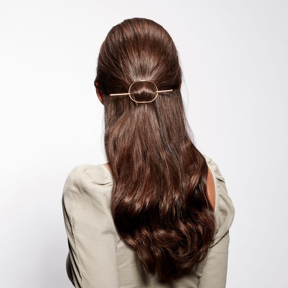 The Hair Edit pin close-up showing secure tip and easy threading for quick hold