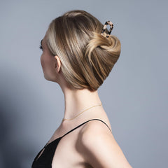 The Hair Edit side profile highlights curved shape for secure, comfortable hold