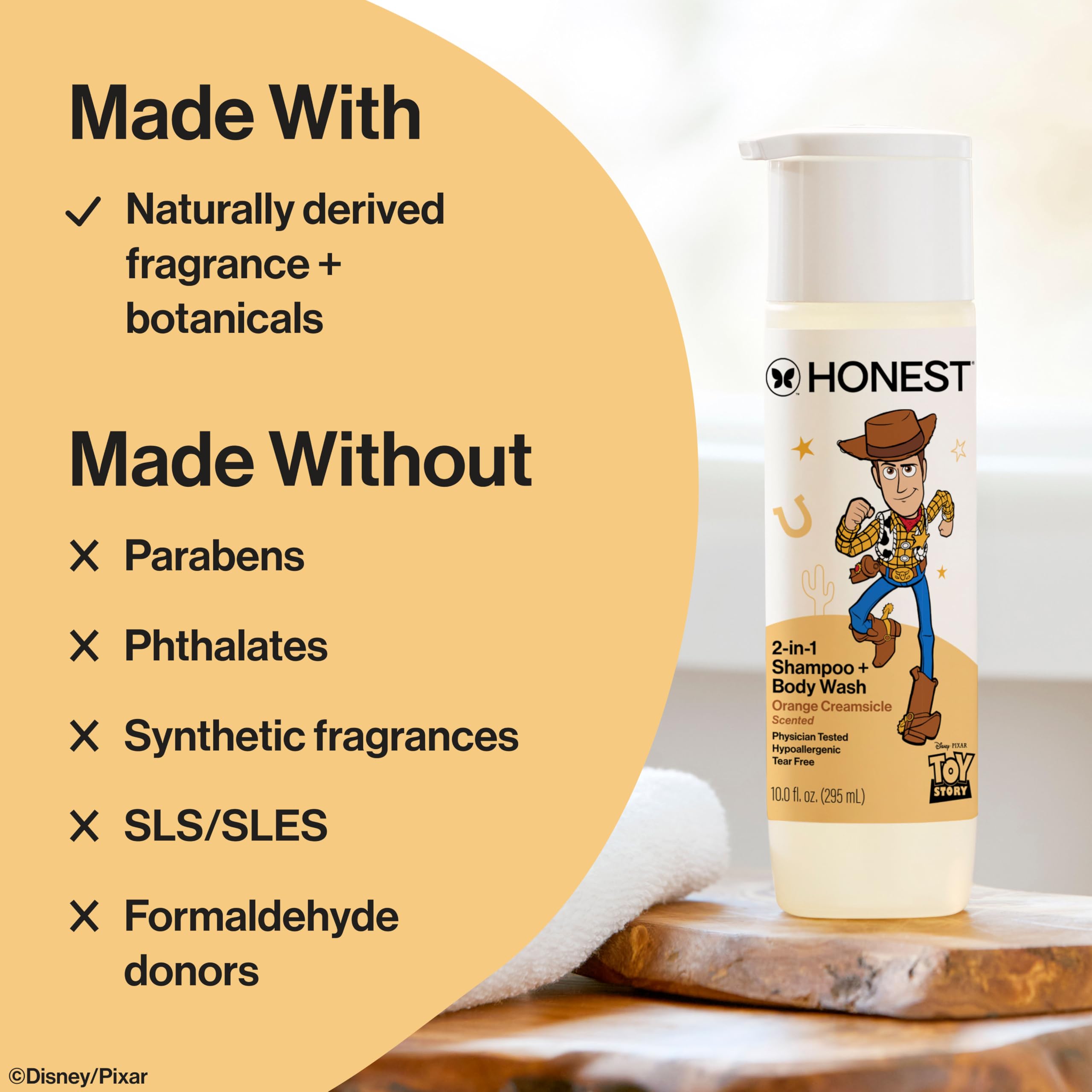 The Honest Company bottle beside Toy Story figure making bath time fun