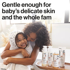 The Honest Company conditioner applied to child hair to reduce knots and ease combing