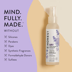 The Honest Company texture on hair strand showing lightweight hydration and smooth finish