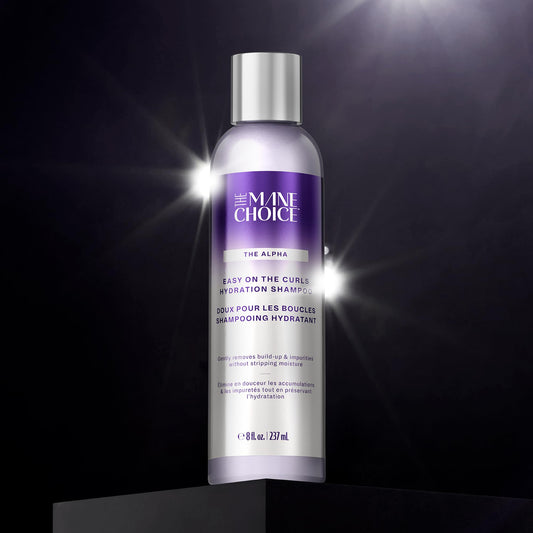 The Mane Choice close-up of shampoo texture illustrates smoothing slip