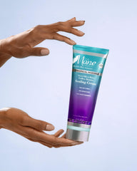 The Mane Choice cream on fingers ready to apply, showing easy spread and control