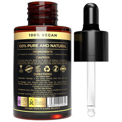 The Organic Forest pipette dispensing precise droplet for blending oils