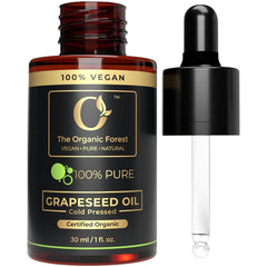 The Organic Forest grapeseed oil front bottle showing label and purity benefits