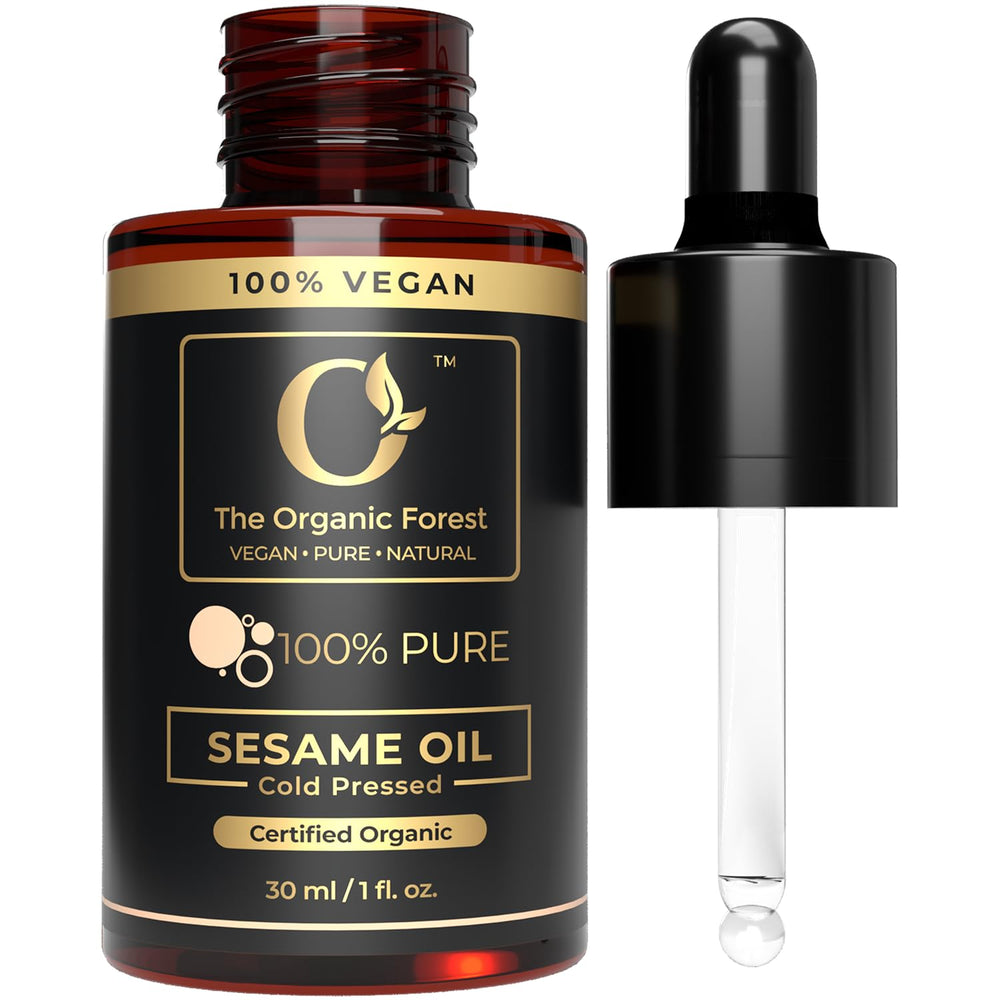 The Organic Forest sesame oil front bottle shows clean organic packaging and purity benefit