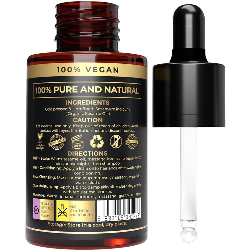 The Organic Forest sesame oil pouring golden drops showing nutrient-rich cold-pressed benefit
