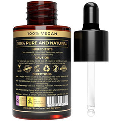 The Organic Forest sesame oil pouring golden drops showing nutrient-rich cold-pressed benefit