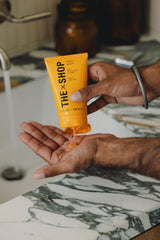 The Shop Uninterrupted exfoliating texture close-up showing gentle particles for smoother skin