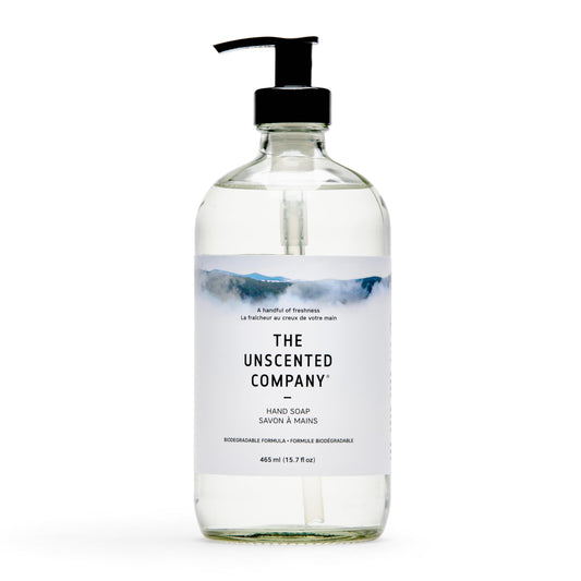 The Unscented Company glass bottle front view showing minimalist label and clean design benefit: upscale countertop look