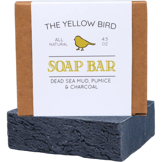 The Yellow Bird soap front packaging showing bar and benefits