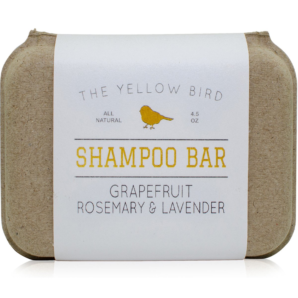 The Yellow Bird front packaging showing shampoo bar and scent label, clear product identity