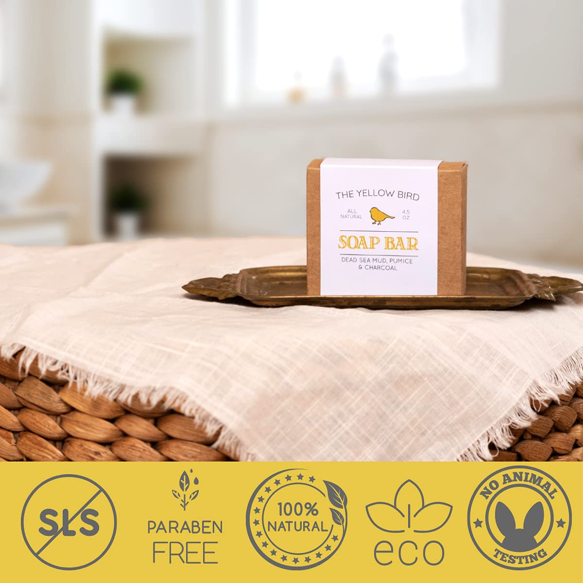 The Yellow Bird soap on wooden dish showcasing drainage and storage benefit