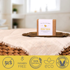 The Yellow Bird soap on wooden dish showcasing drainage and storage benefit