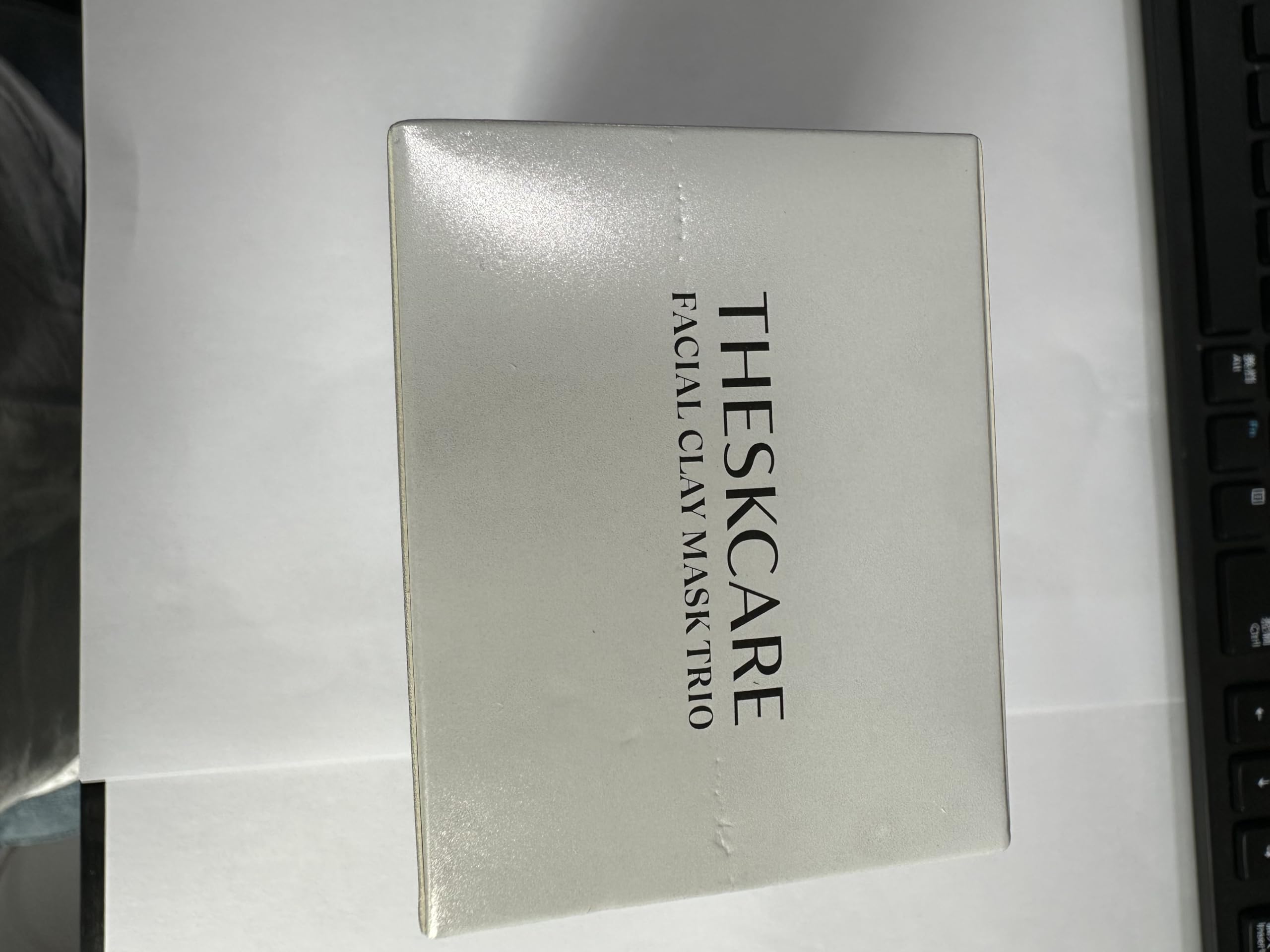 THESKCARE rinsing mask at washbasin lifestyle shot, emphasizing gentle removal and refreshed skin