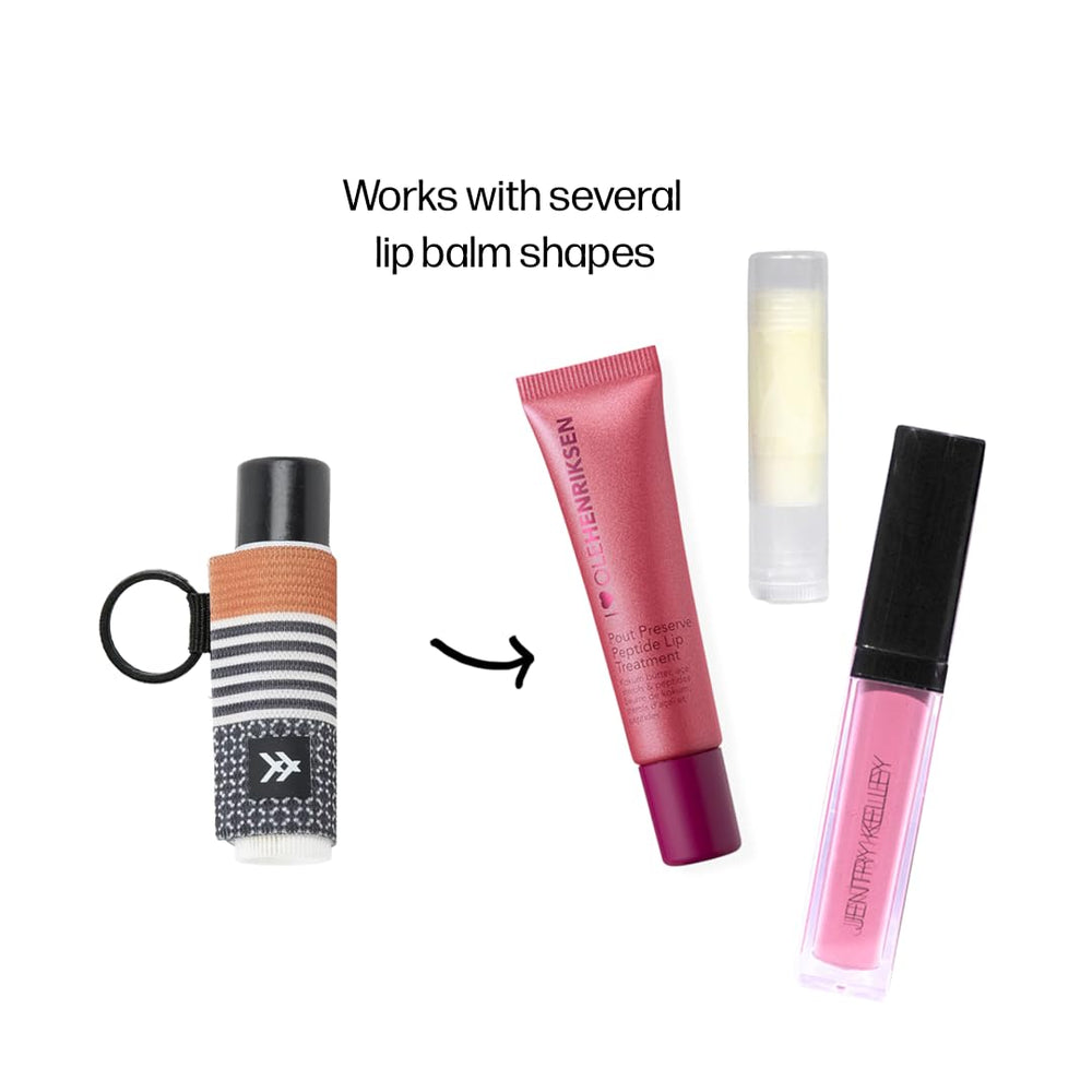 Thread Wallets Sanders holding multiple lip products, versatile fit demonstrated