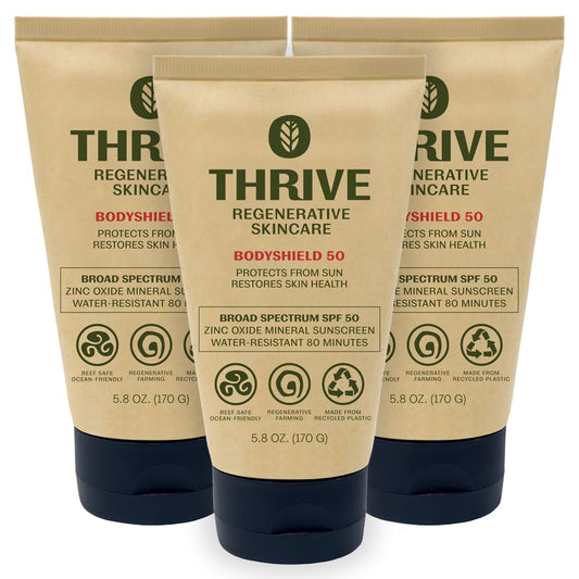 Thrive Natural Care front tube showing label and SPF50 protection benefits